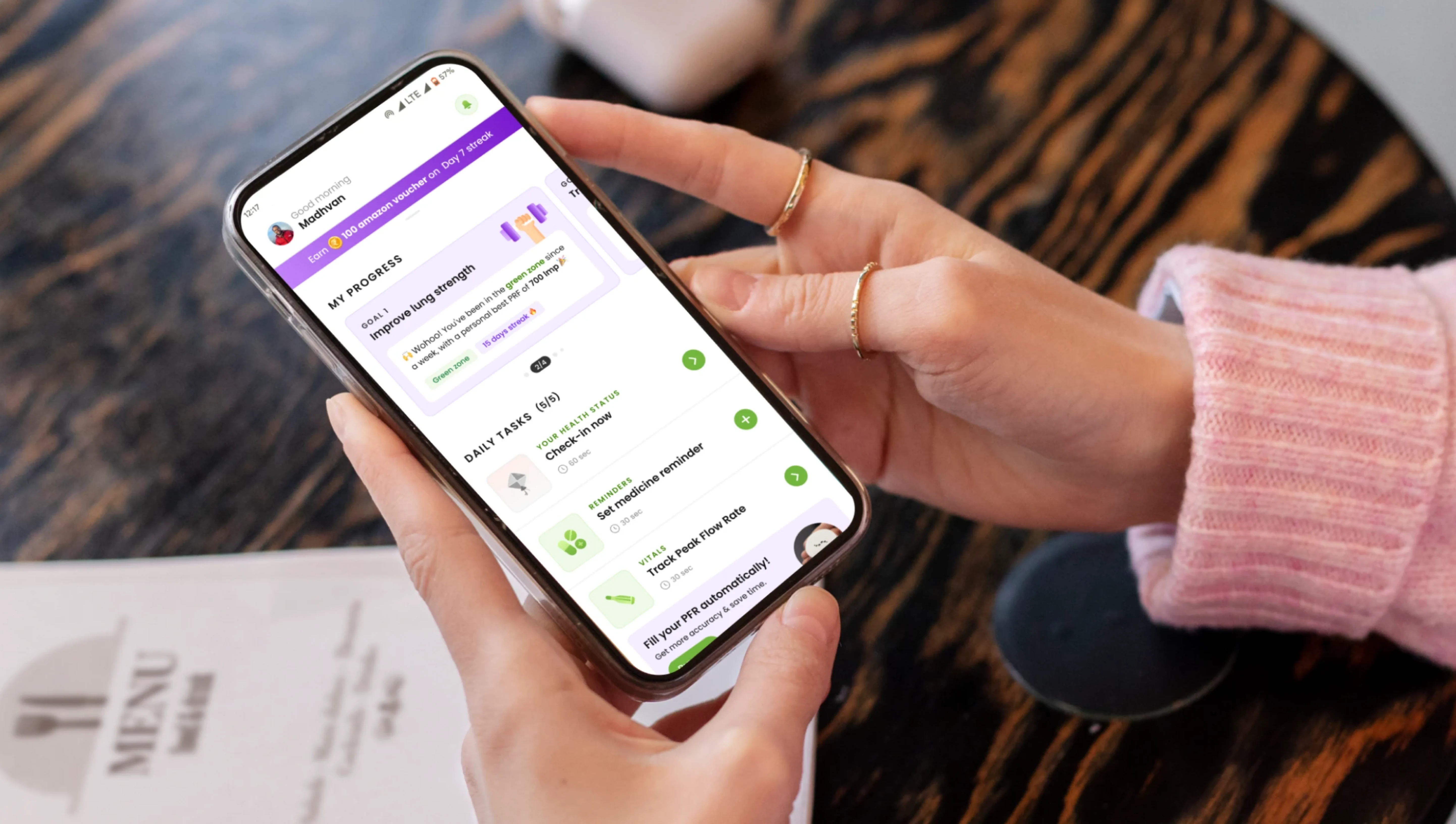 A patient checking their daily lung-health progress, goals, and tasks on the Breathefree app on their phone